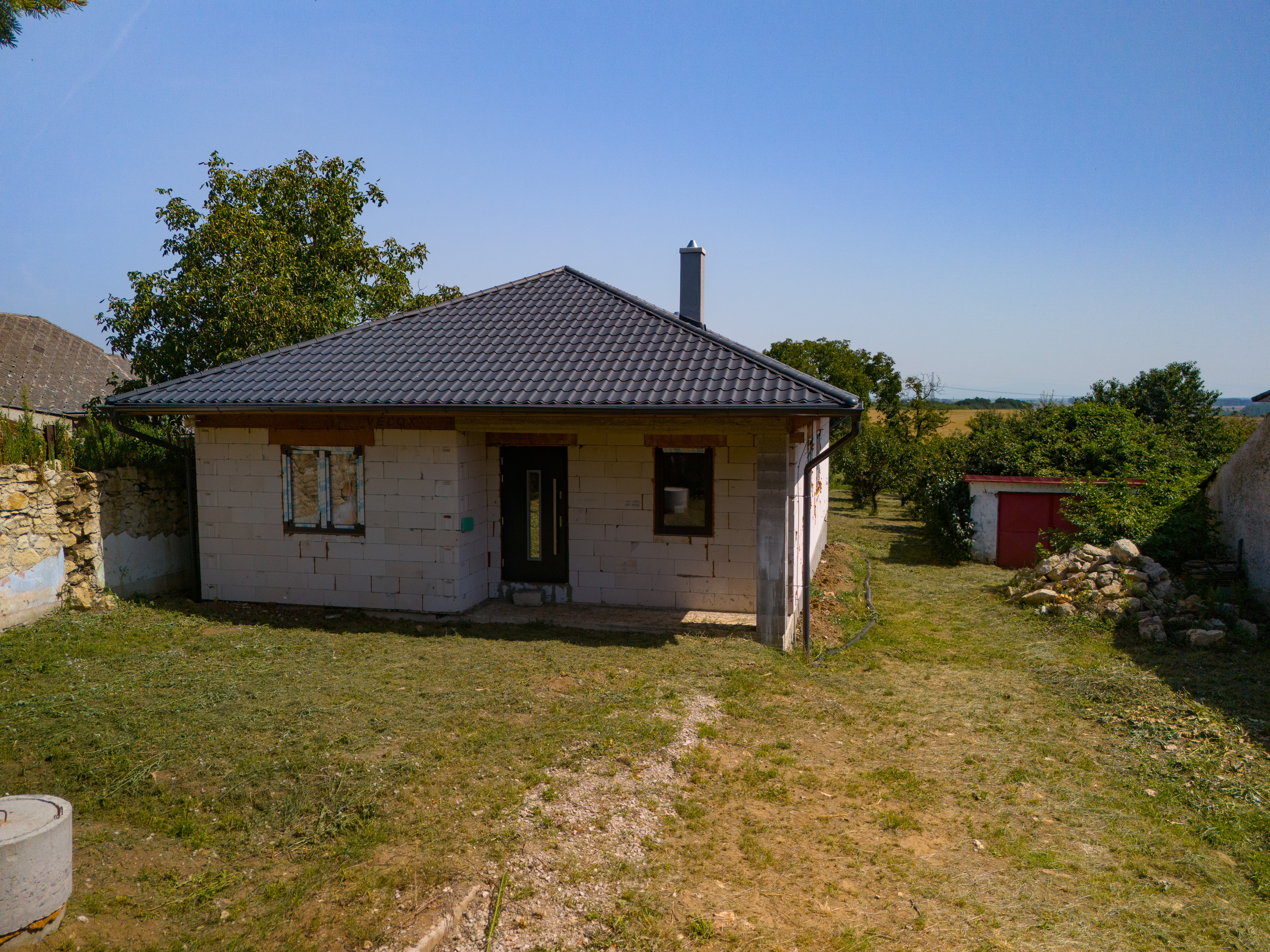 NOVOSTAVBA - 4 izbový bungalov - obec Veľaty